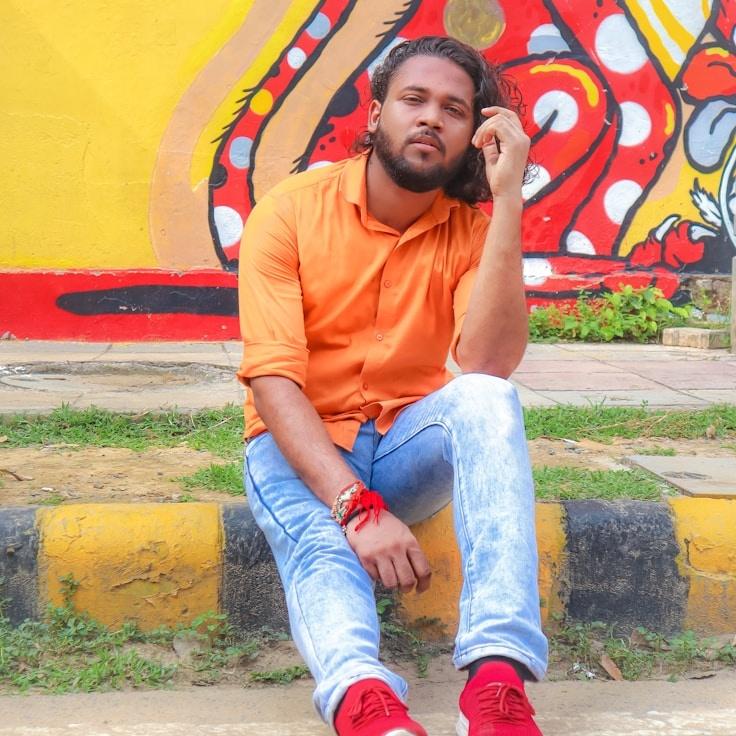 Alex Carter, Lead Design Curator at Ever Green Vector, reviewing corporate floral arrangements